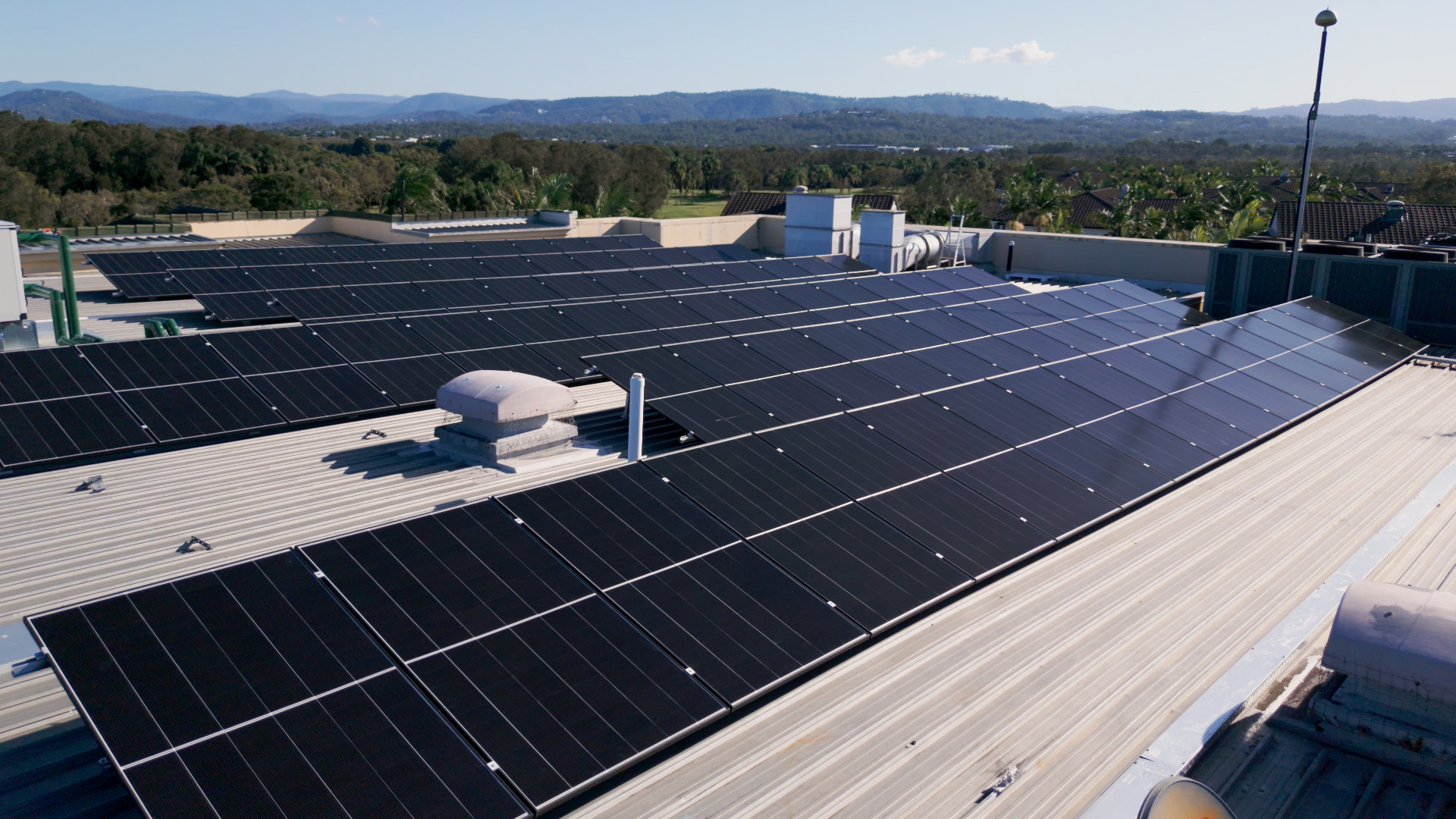 Mercure Gold Coast Resort, Solar Panel Installation. Solar Panels install view from room of building, looking out to the Gold Coast Hinterland.